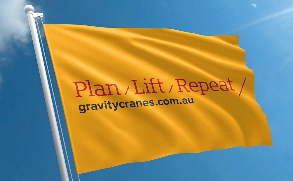 Gravity Cranes tagline on a flag