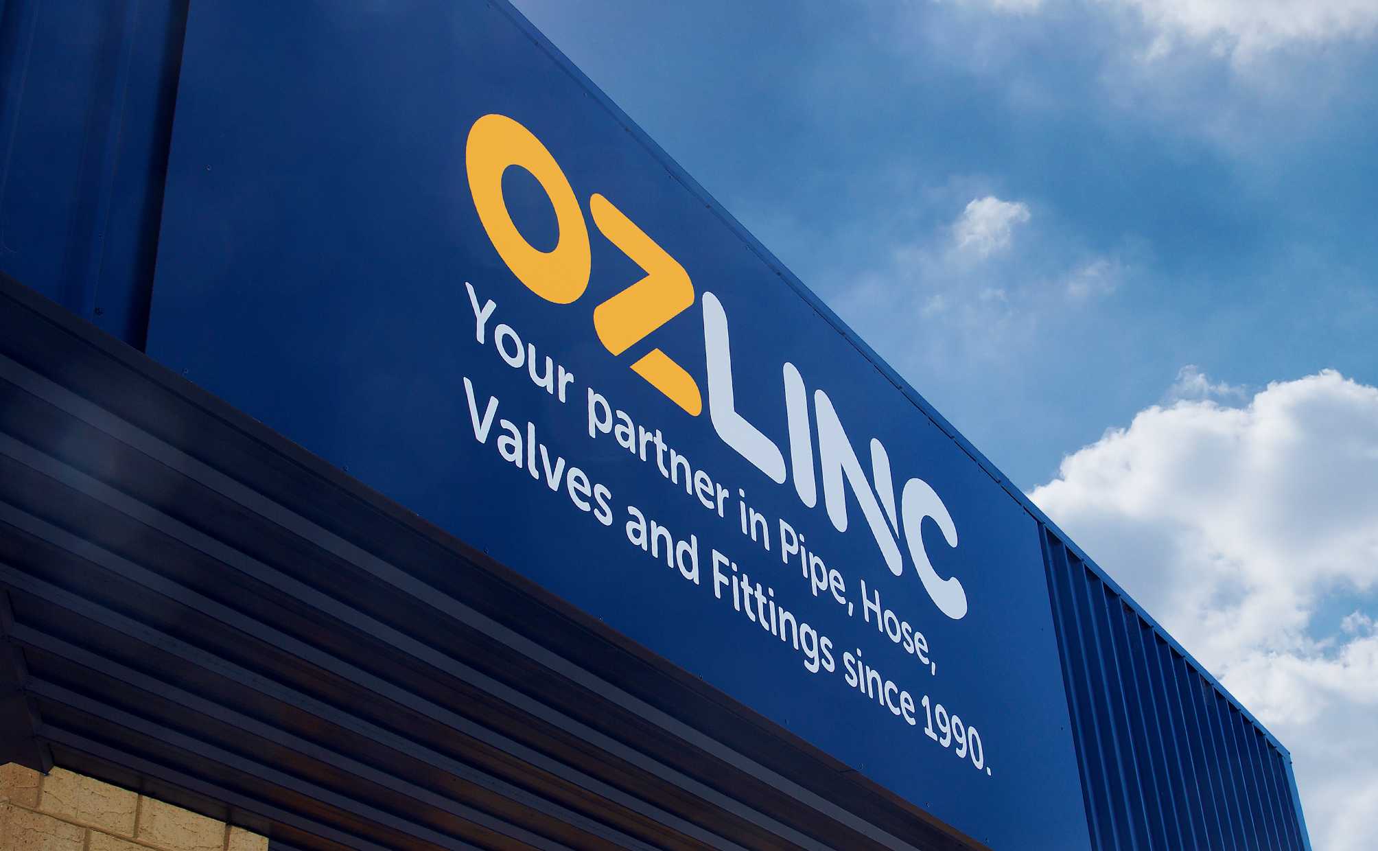 Ozlinc building signage